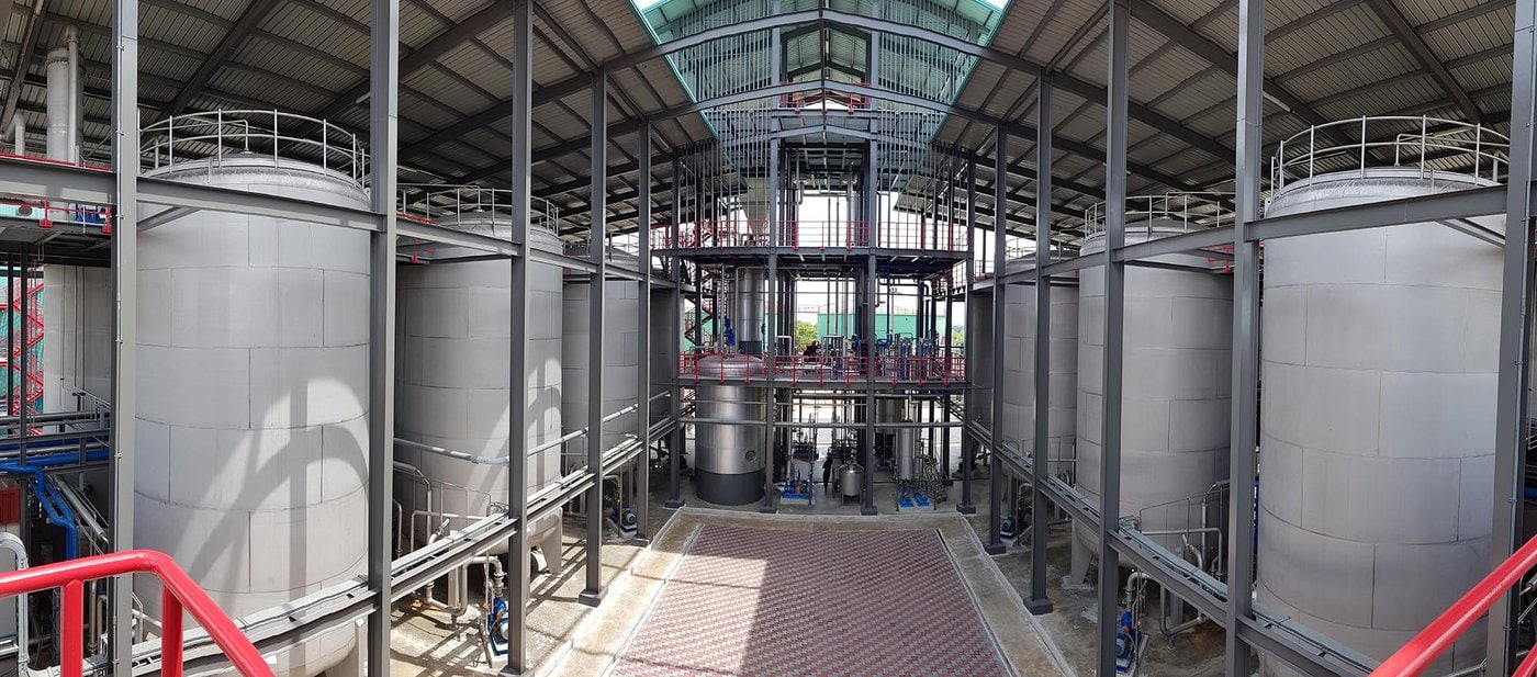 Beverage production machinery in Thailand, including wine fermentation and decantation equipment