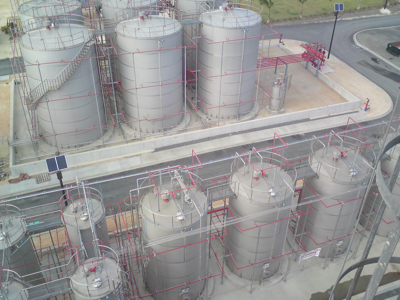 Large storage tanks for rum in US Virgin Islands, similar to wine storage tanks in wineries