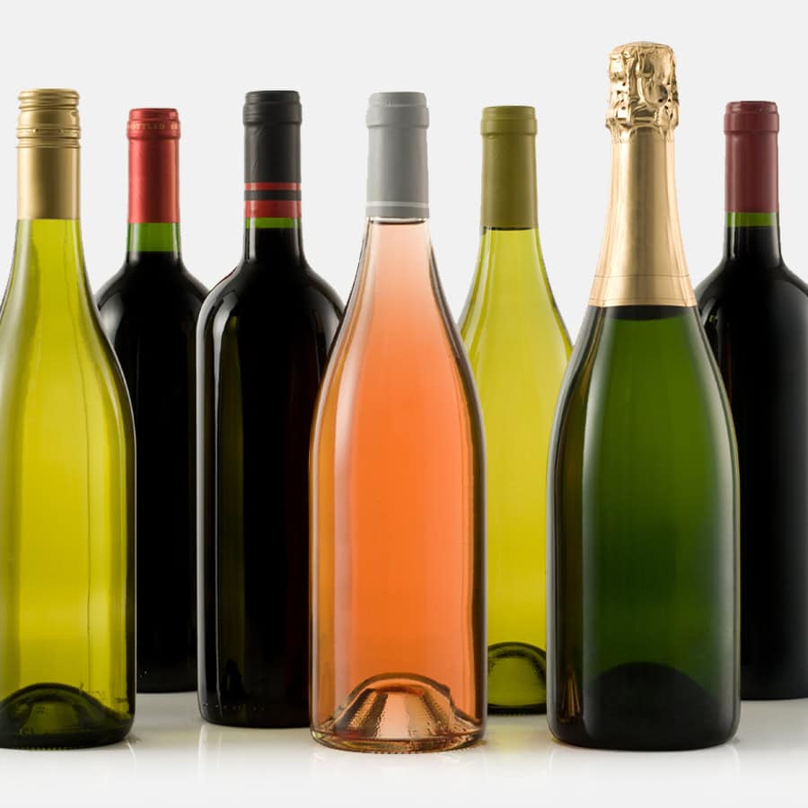 Label-less wine bottles, representing non-alcoholic product services and beverage development solutions