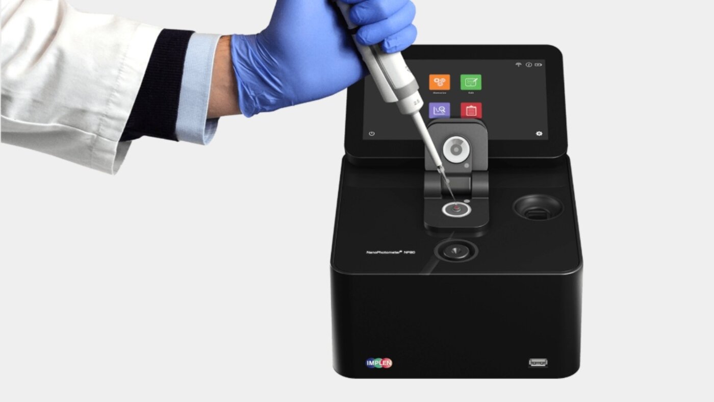 Technician using ImplenQ analyzer for beverage quality control at BevZero
